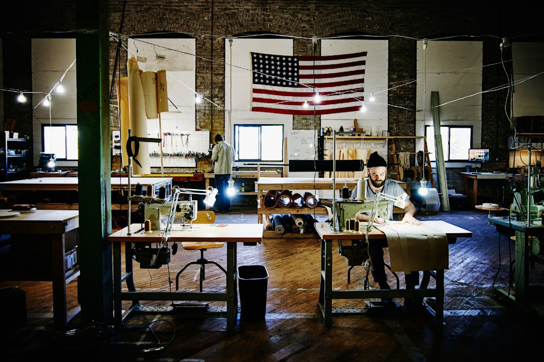 2 local business owners working in a workshop.jpg